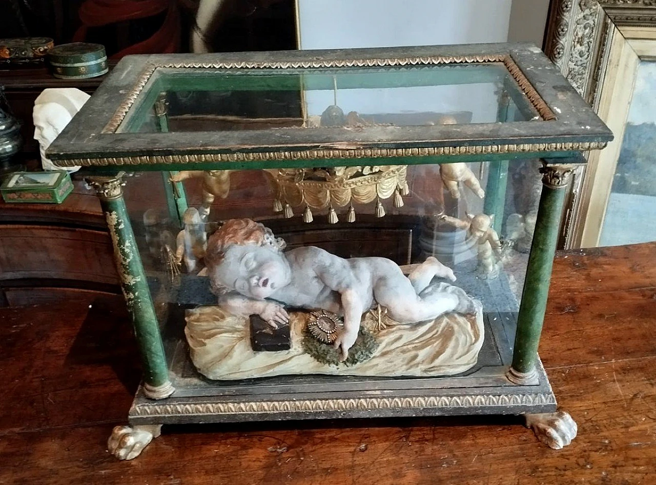Stucco sleeping Baby Jesus sculpture in lacquered case, 18th century 1