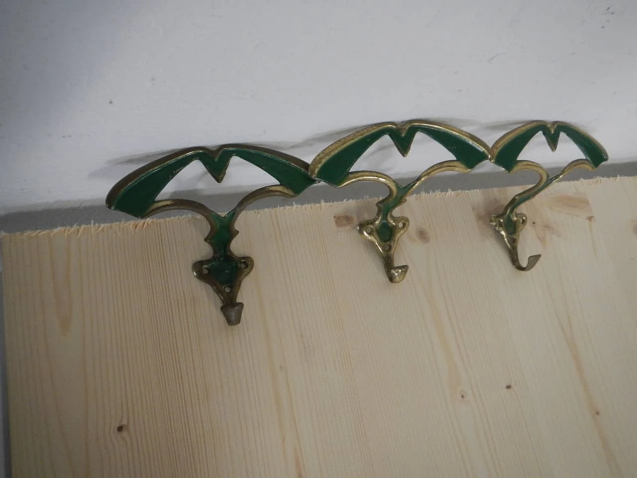3 Gilded and green laquered iron clothes hangers, 1950s 2