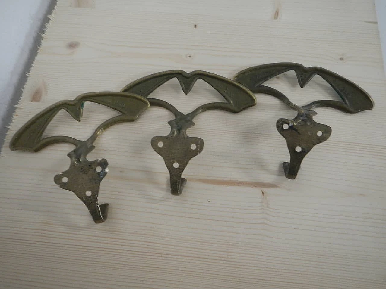 3 Gilded and green laquered iron clothes hangers, 1950s 3