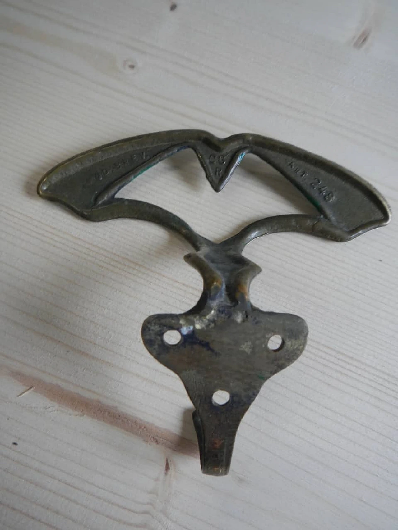 3 Gilded and green laquered iron clothes hangers, 1950s 5