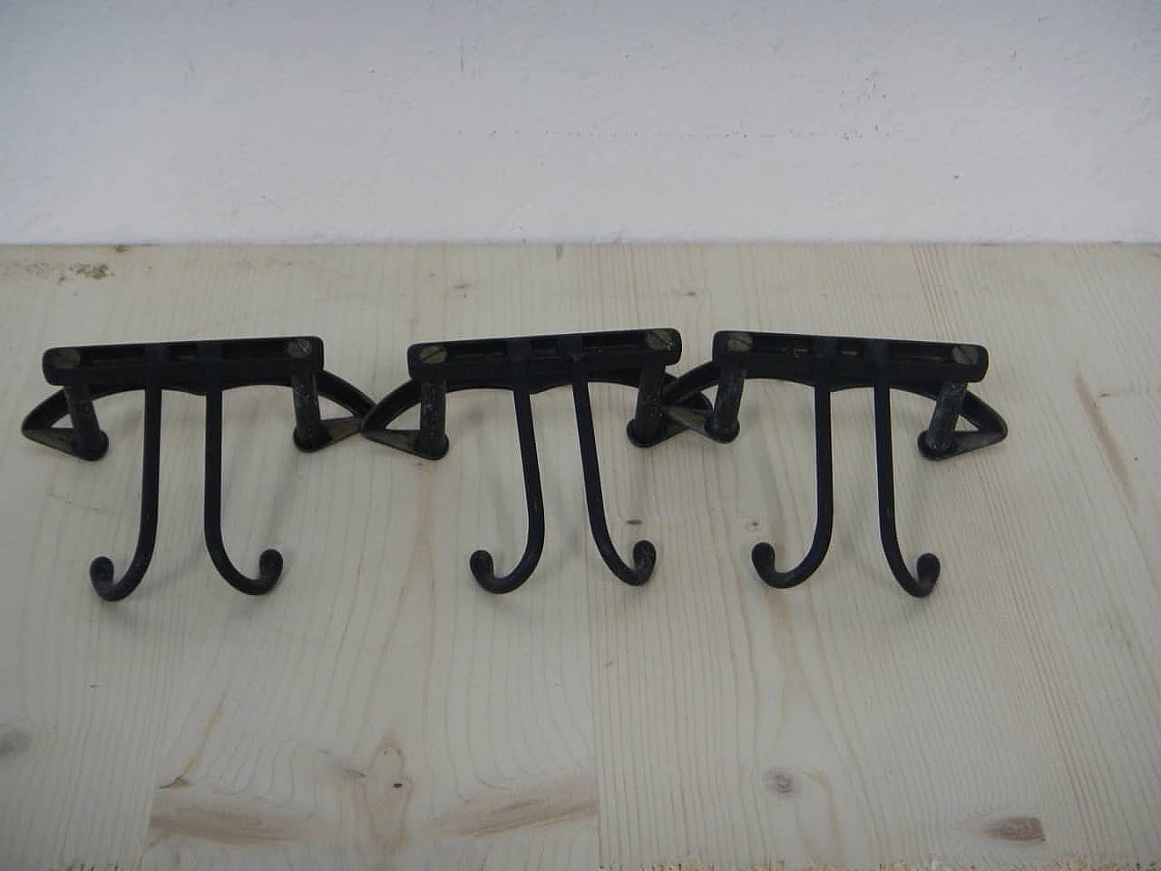 3 Iron and brass wall clothes hangers, 1970s 5
