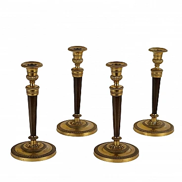 4 Bronze Empire candlesticks attributed to Ravrio, early 19th century