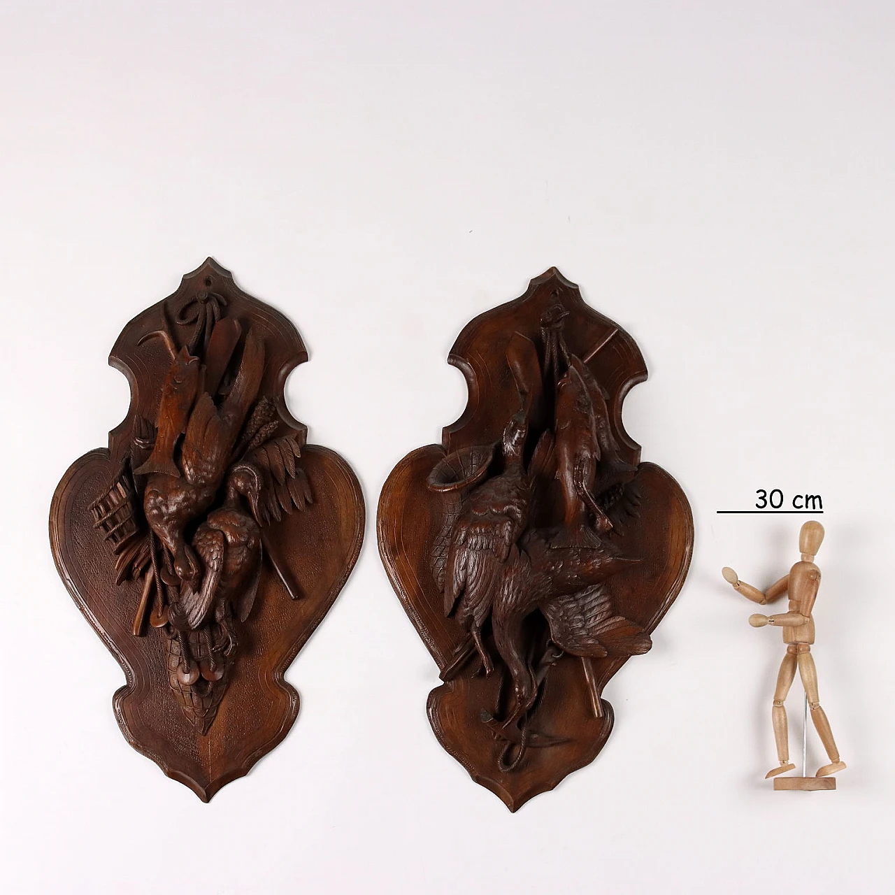 Pair of walnut plaques with game, early 20th century 2
