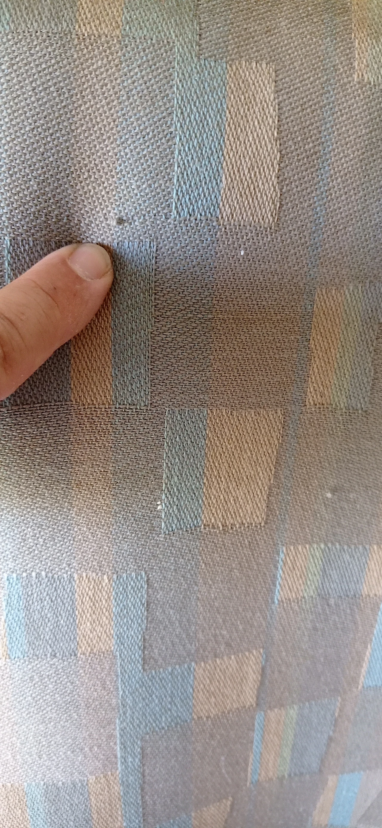 Poltrona Torsi in tessuto geometric di Paolo Deganello per Cassina 115