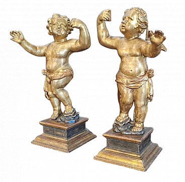 Pair of putti in gilded wood, 17th century | intOndo