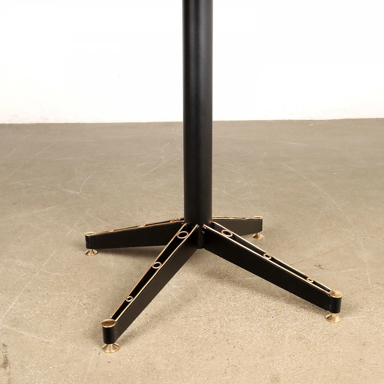 Table with round teak veneer top and metal & brass legs, 1950s 4