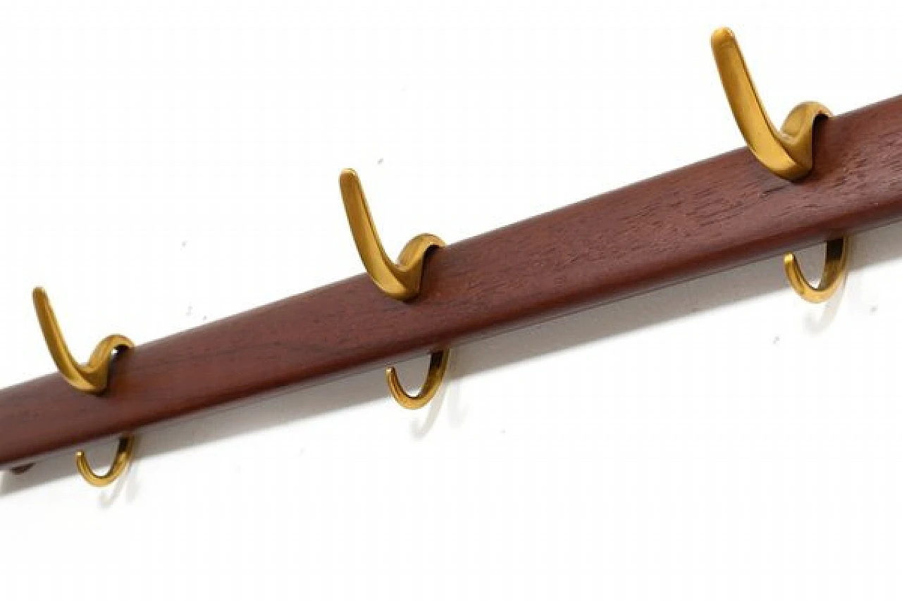 Teak and brass coat hanger by Carl Auböck, 1950s | intOndo