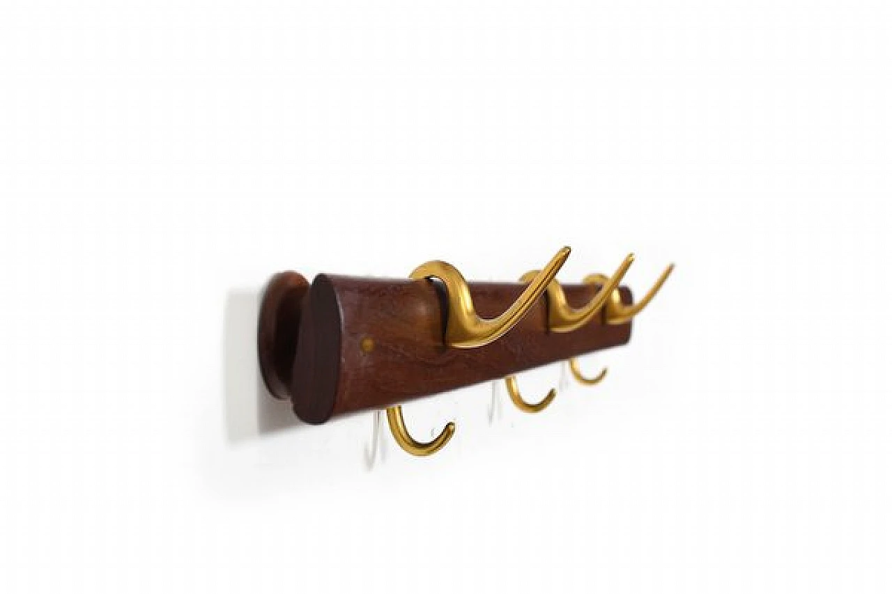 Teak and brass coat hanger by Carl Auböck, 1950s | intOndo