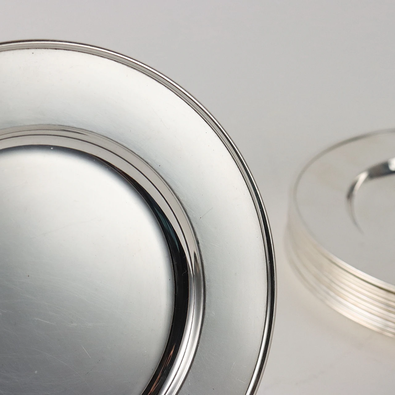 12 Piattini portapane in argento 3