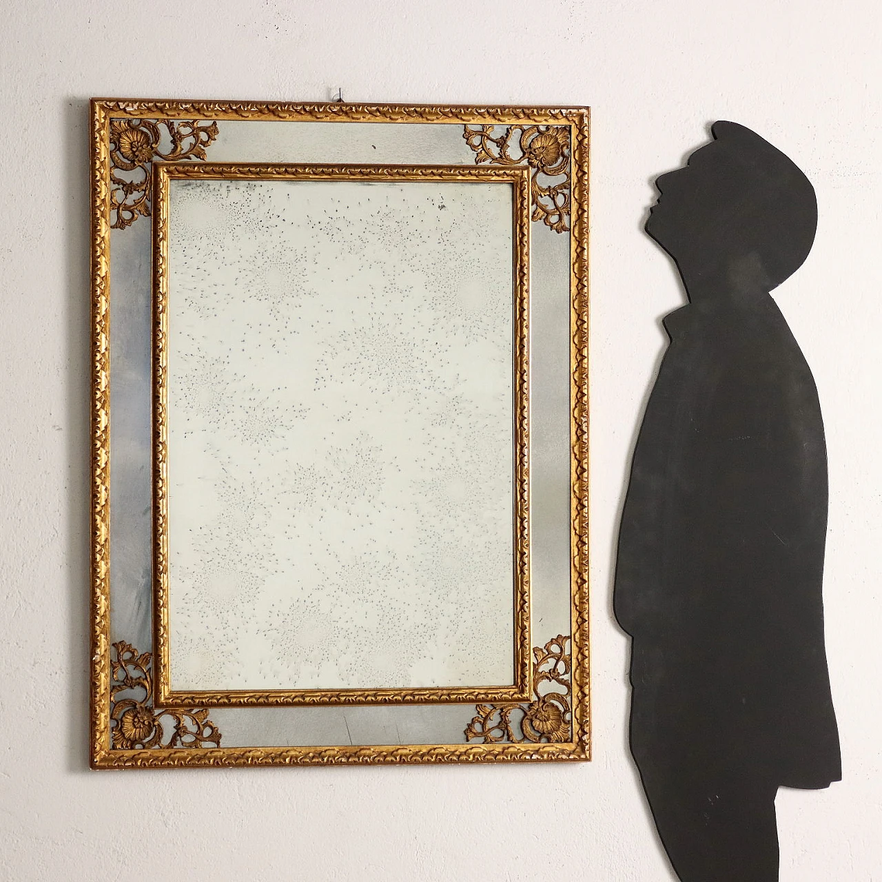 Mirror with carved and gilded frame with floral motifs 2