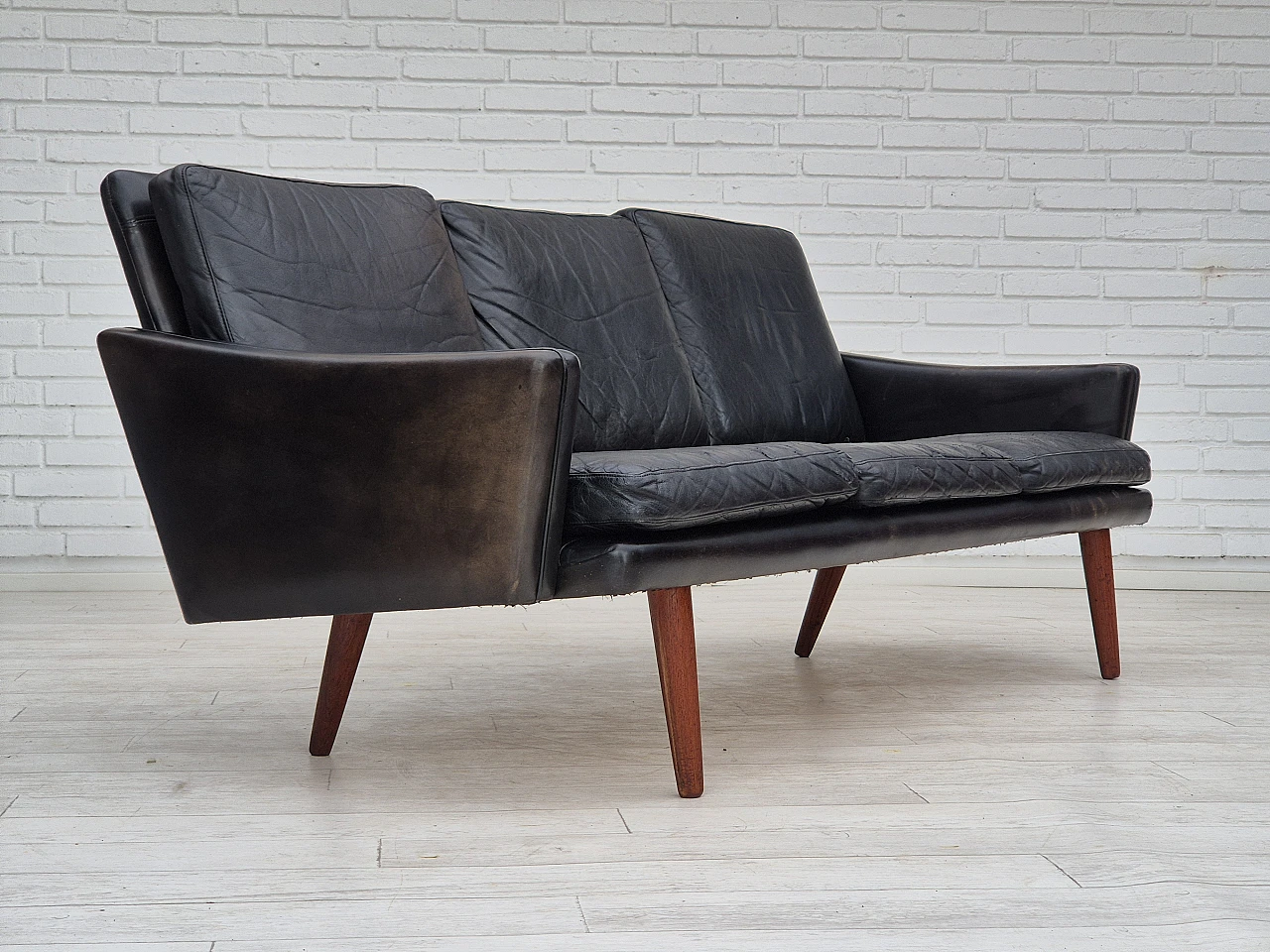 Danish three-seater teak and black leather sofa, 1970s 1