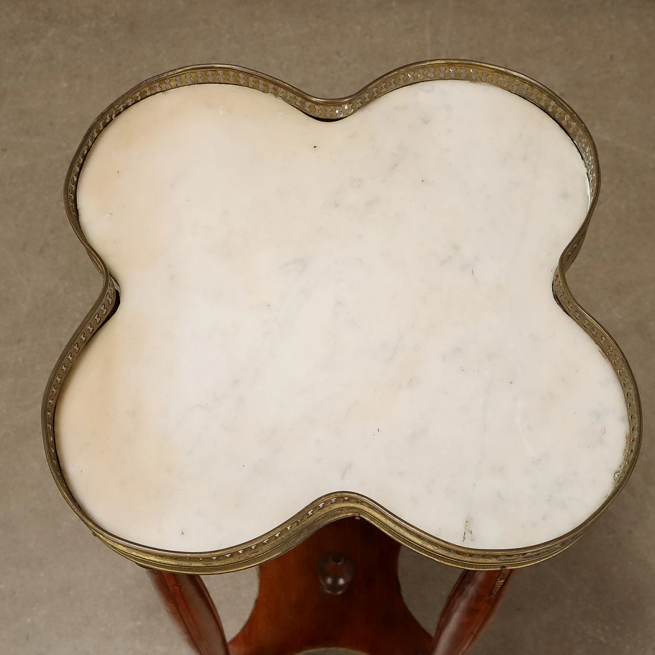 Wooden gueridon with saber feet, marble top & gilded sheet metal 3