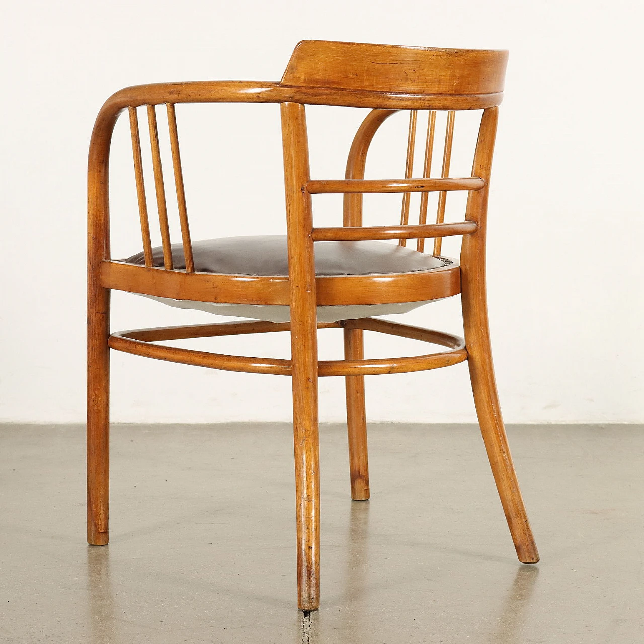 Pair of beech and skai armchairs, 1950s 9