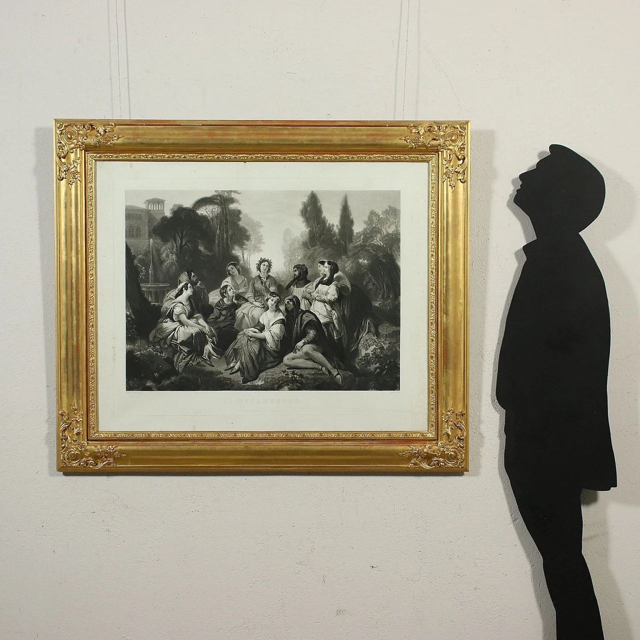 Pair of carved and gilded wooden frames with engravings, 19th century 2