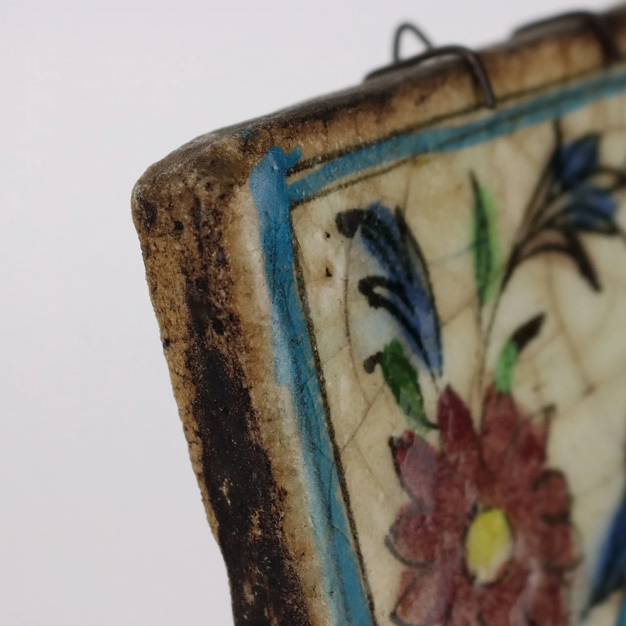 Pair of hand-painted glazed terracotta tiles, 19th century 6