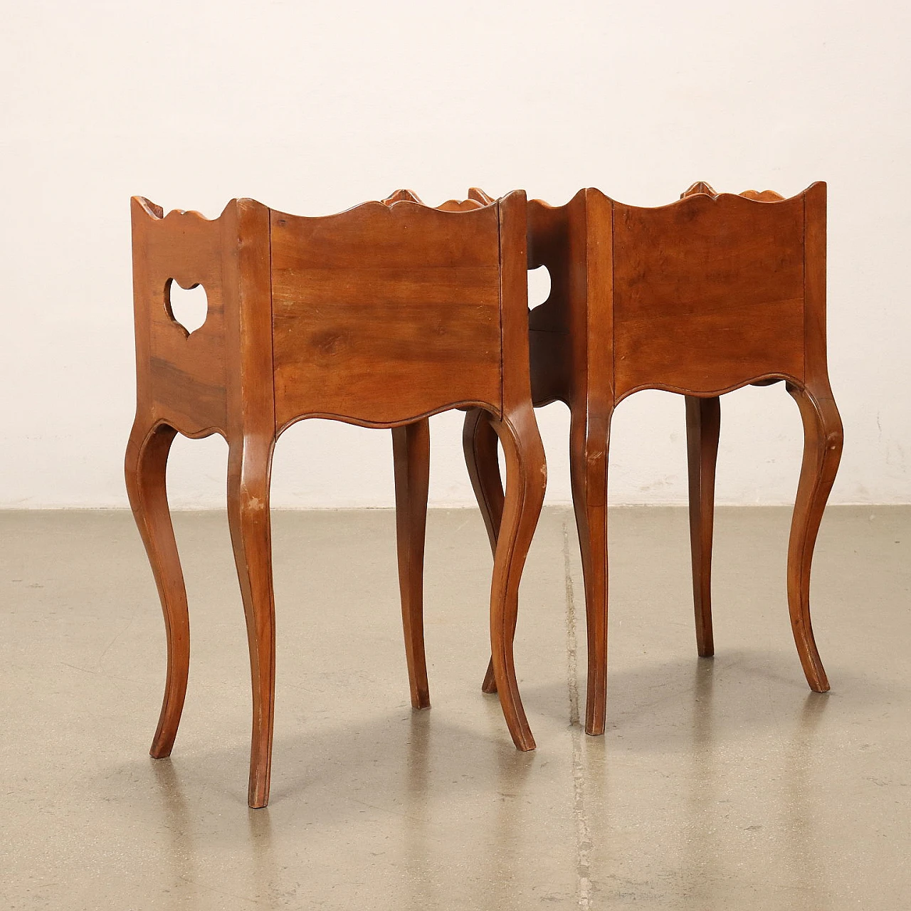 Pair of mahogany bedside tables with open compartment and carvings 7