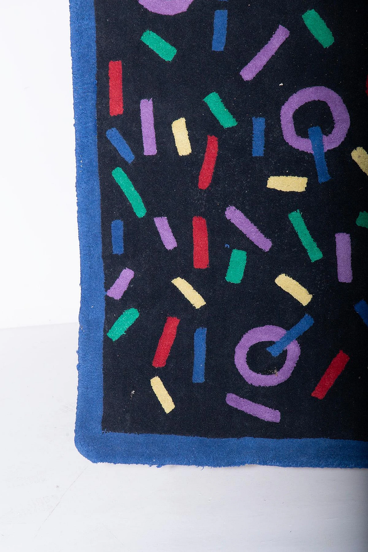 Wool rug with multicolored geometric patterns, 1980s 3