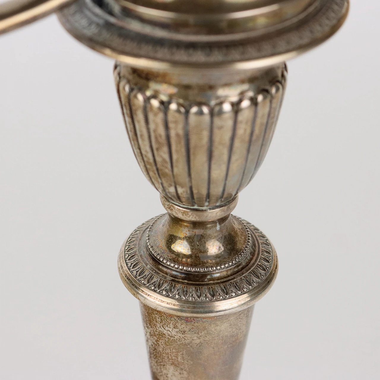 Three-armed silver candelabra with four ferine-shaped feet 6
