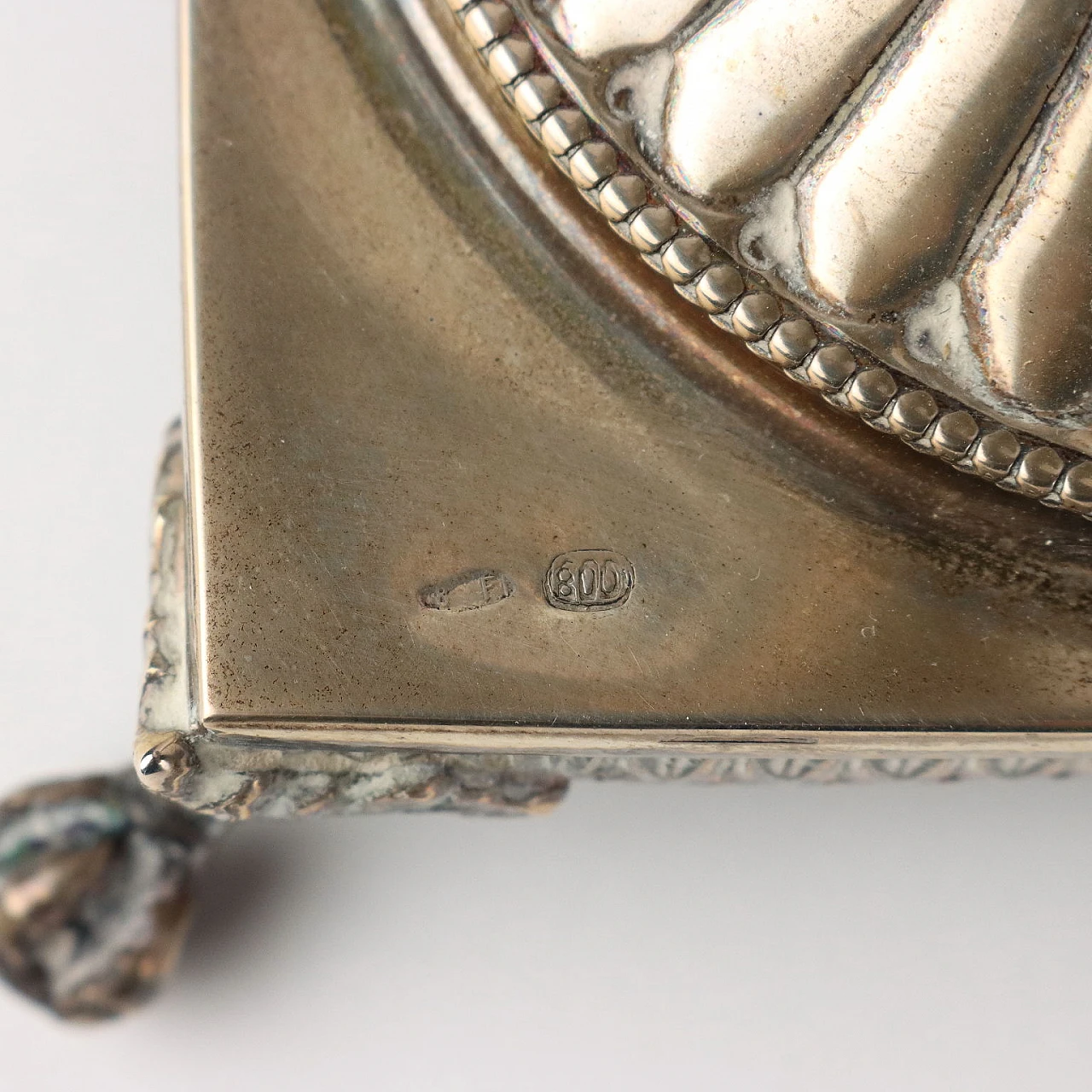 Three-armed silver candelabra with four ferine-shaped feet 9