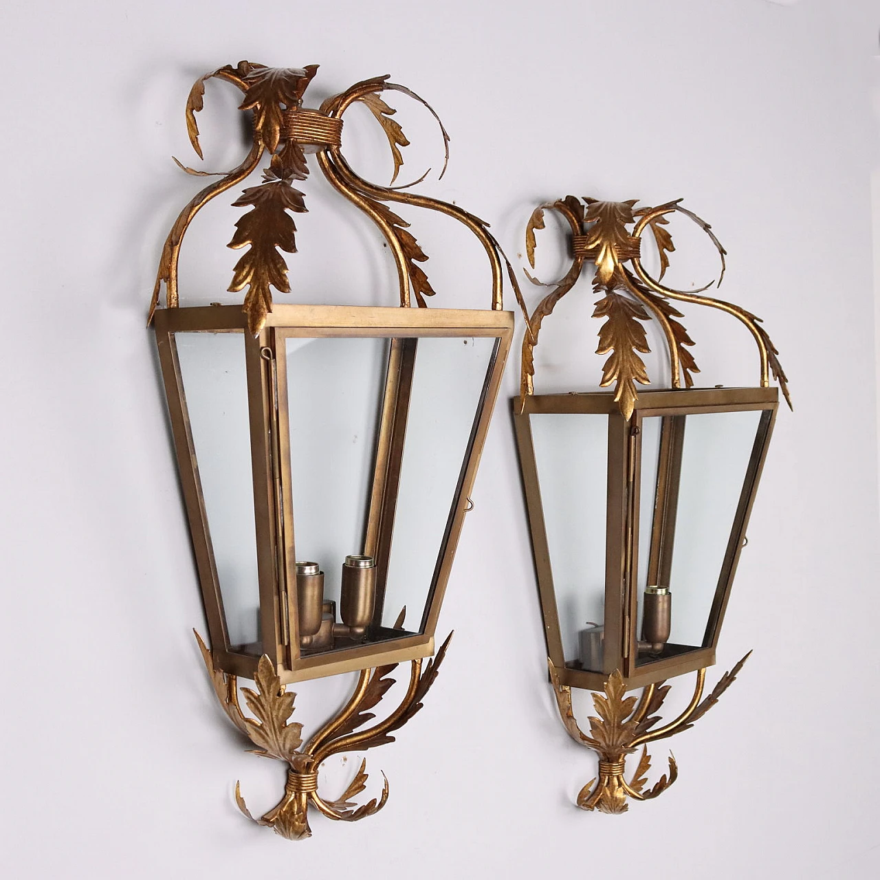 Pair of brass & iron wall lights with floral motifs 1