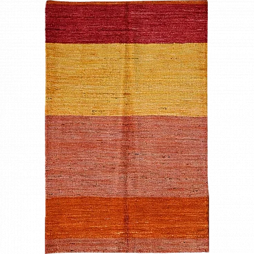 Taimany Afghan rug with color variation from red to orange