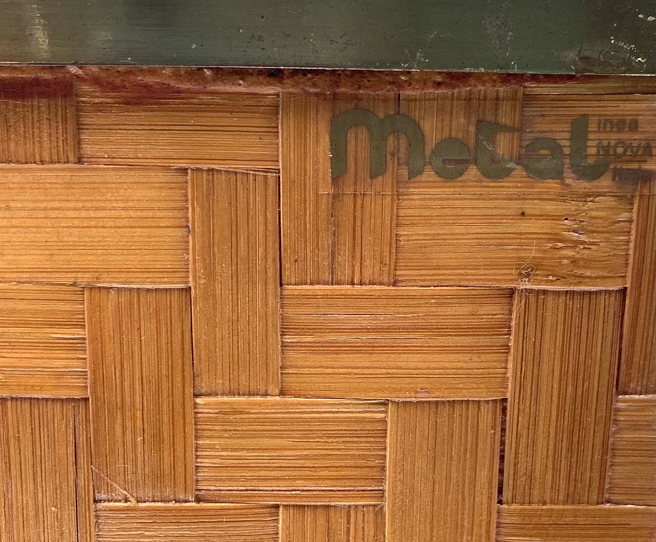 Hollywood regency brass and woven bamboo magazine rack, Metal Linea No 7