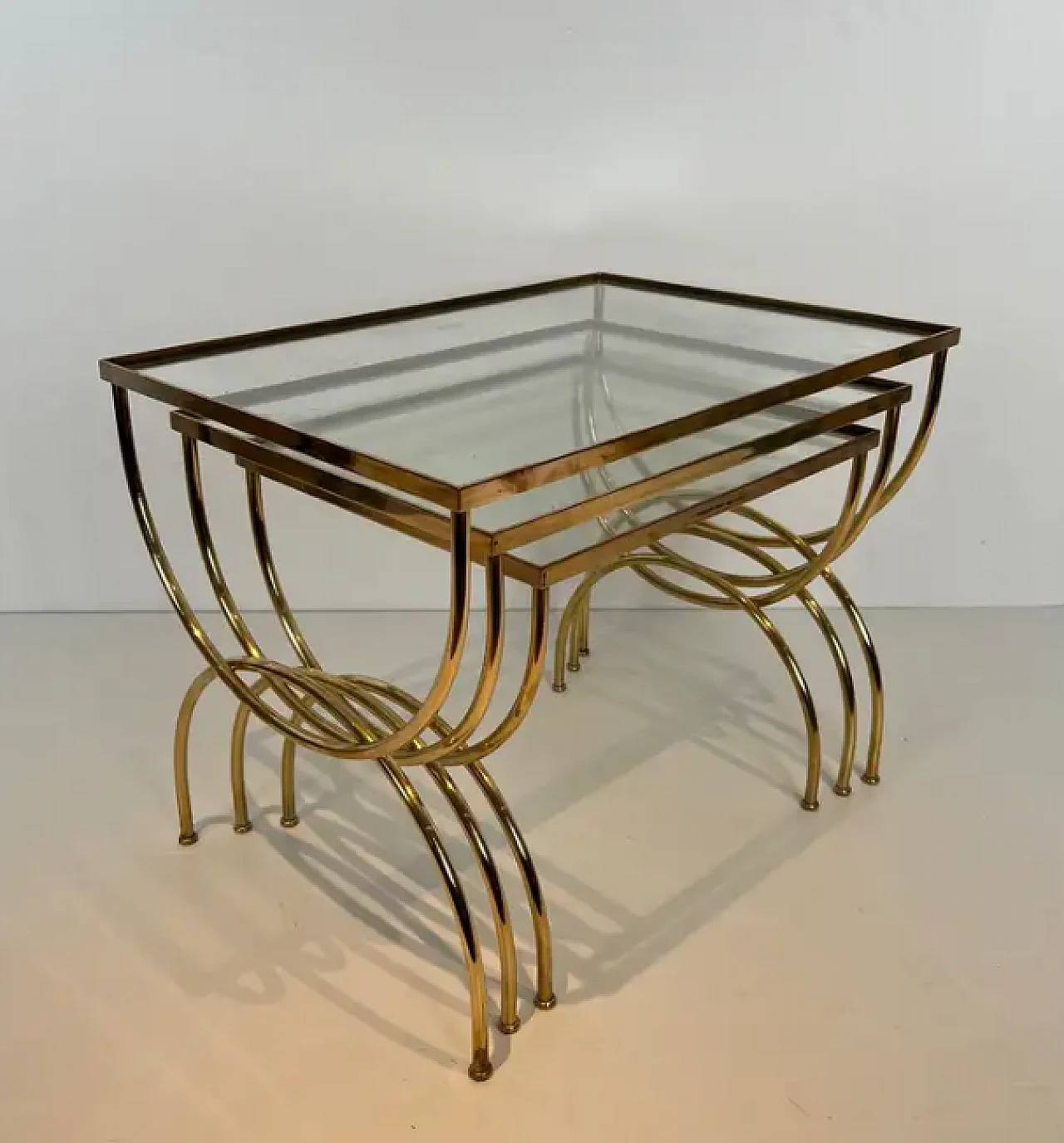 3 Brass nest side tables with arched base, 1940s 3