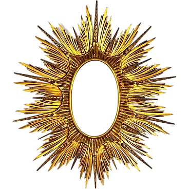 Sun and spikes mirror in gilded wood, early 20th century