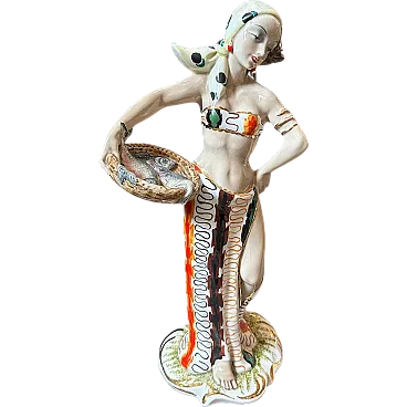 Ceramic figure of a woman with fish, 1950s