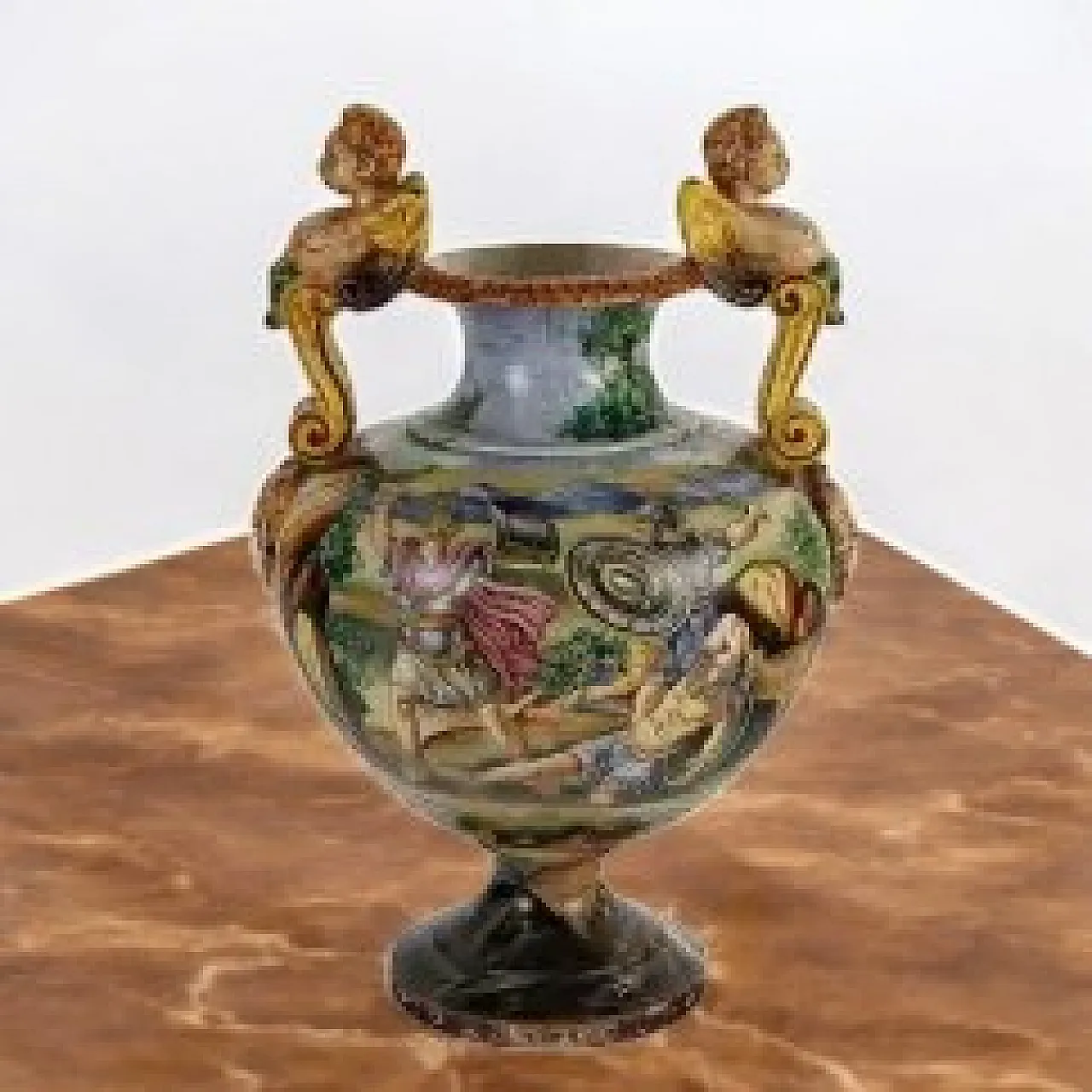 Painted majolica vase with winged figures and masks 2