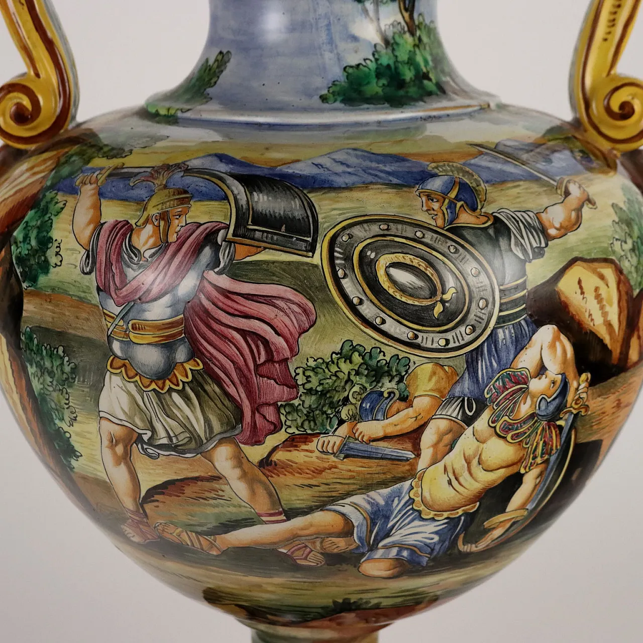 Painted majolica vase with winged figures and masks 5
