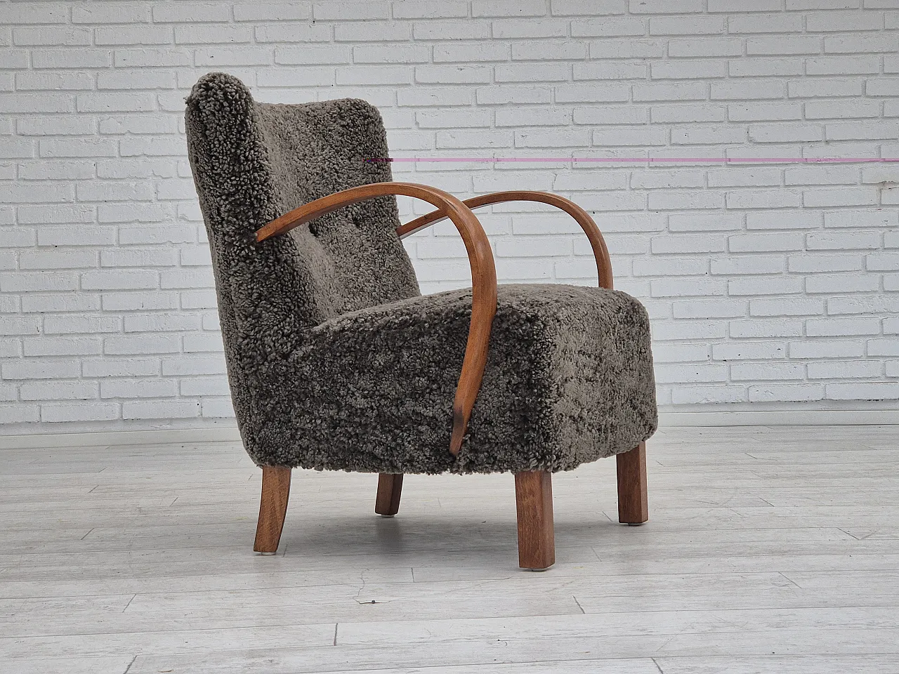 1960s, reupholstered Danish art deco armchair, genuine sheepskin. 1