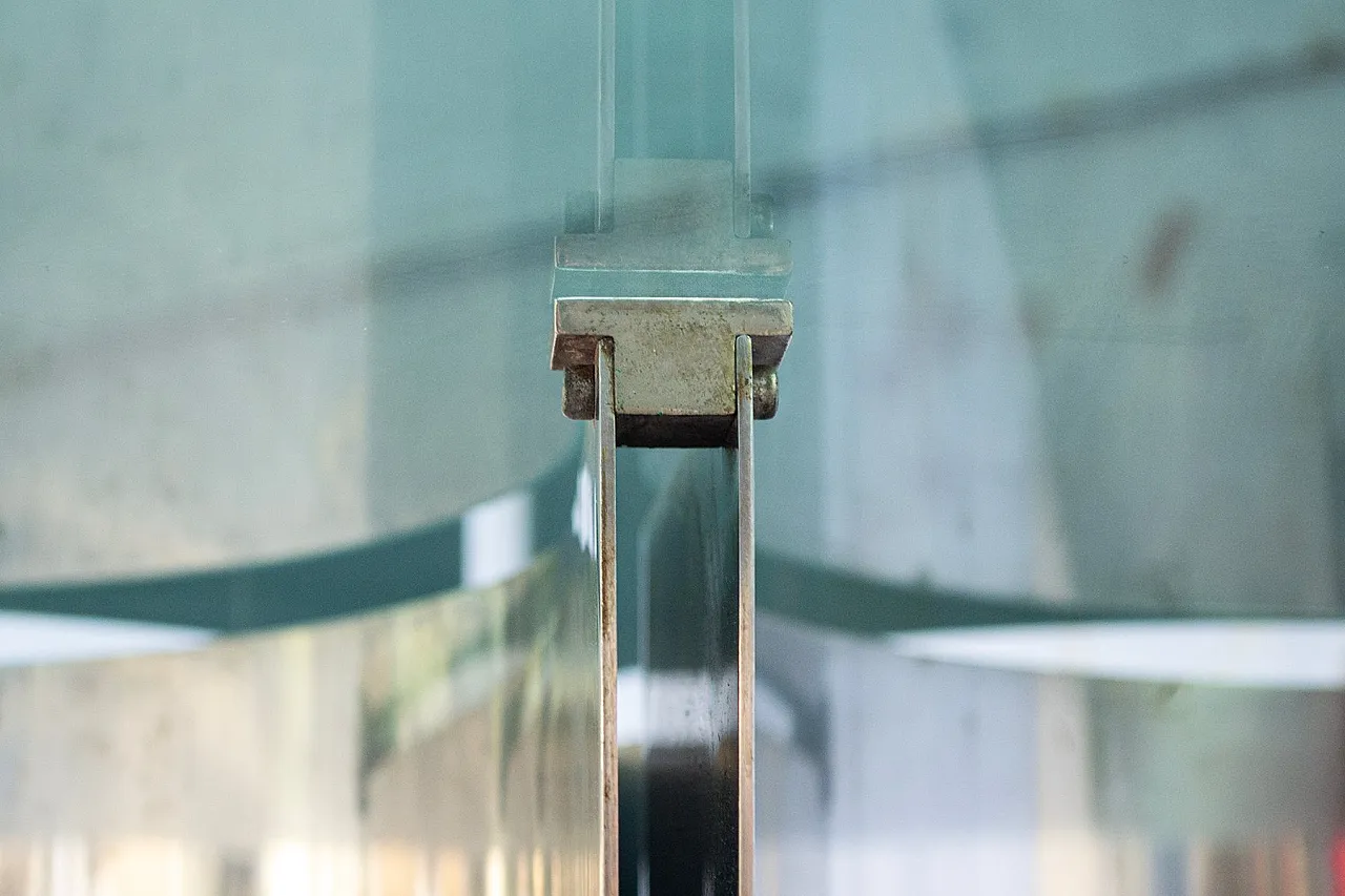 Space Age round steel and glass table, 1970s 5