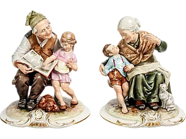 Nonni e nipoti, coppia di sculture in ceramica di B. Merli, tardo '900