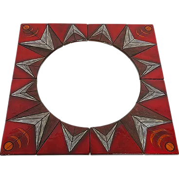 Specchio in ceramica raffigurante un sole stilizzato, anni '60