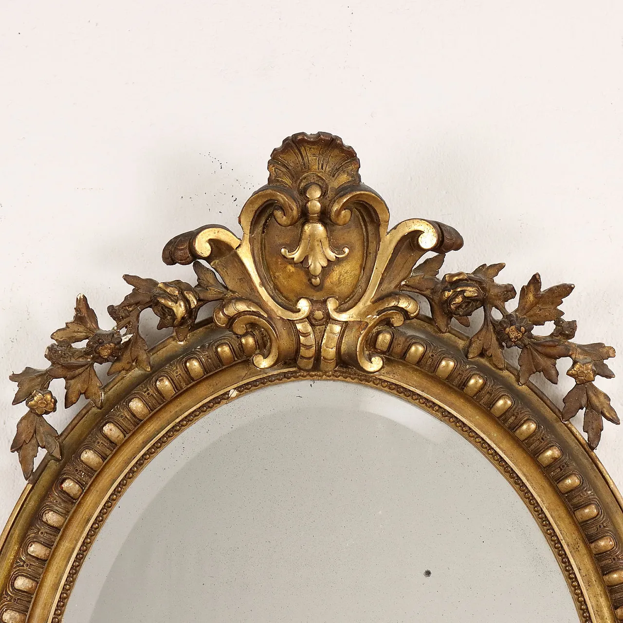 Oval mirror with gilded frame and curl and leaf motifs 3