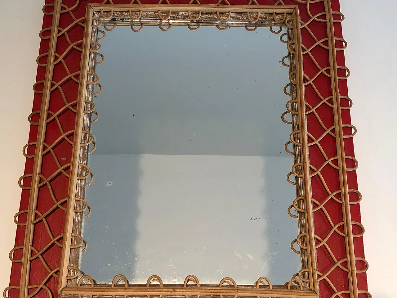 Specchio in rattan su sfondo rosso, anni '40 3