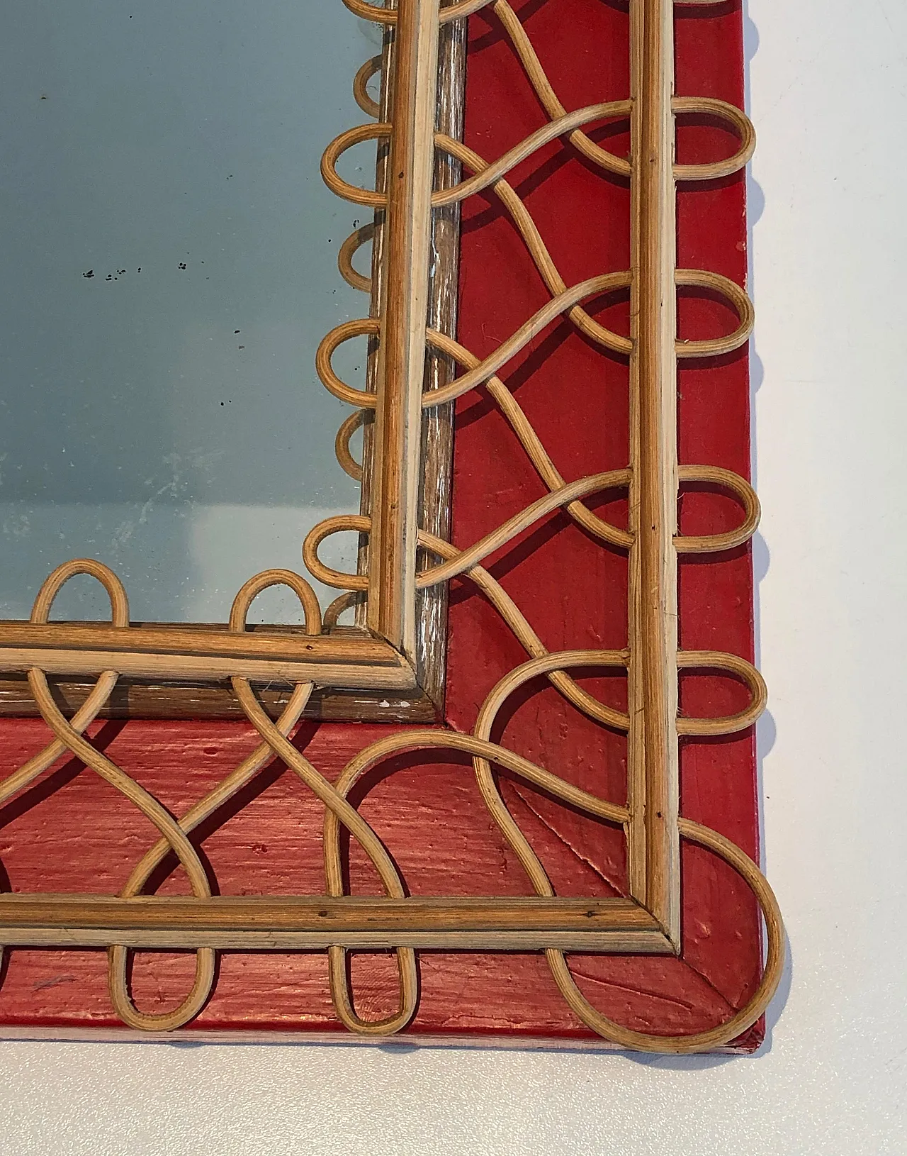 Specchio in rattan su sfondo rosso, anni '40 15