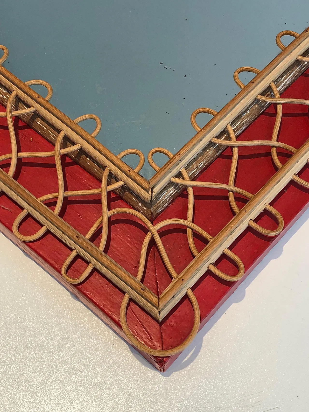 Specchio in rattan su sfondo rosso, anni '40 16