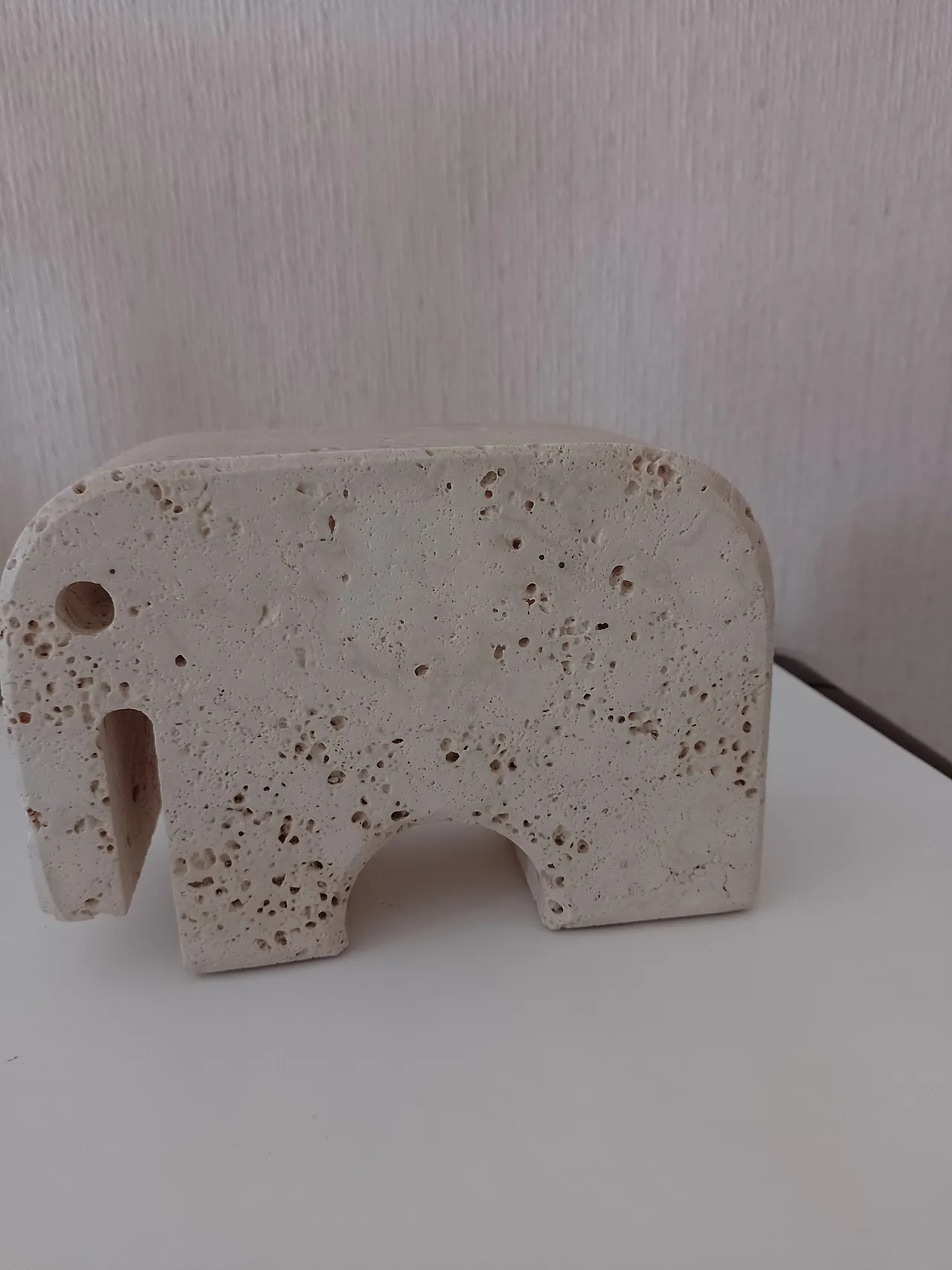 "Elephant" book holder in travertine, 70s 2