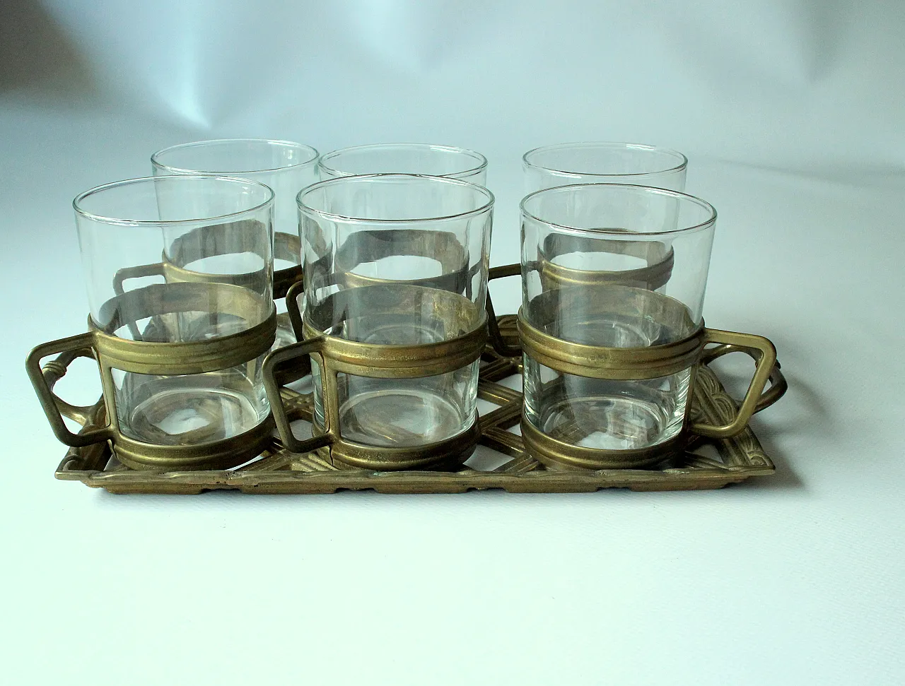 6 Brass and glass tea cups on a brass tray, 90s 1