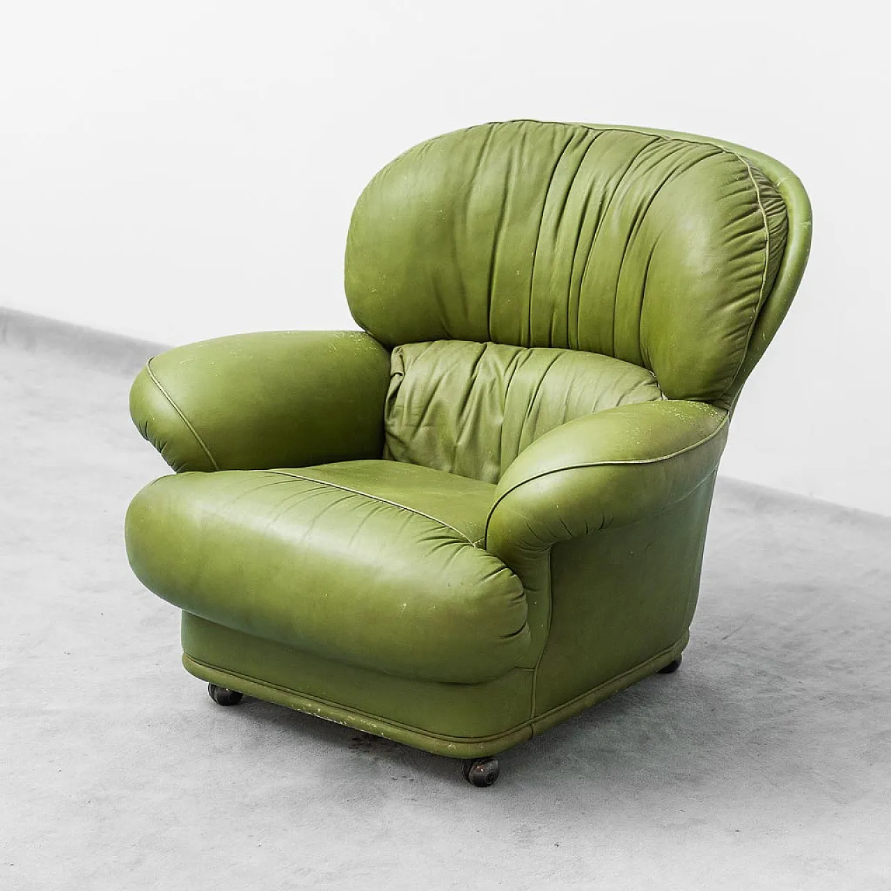 Armchair with green leather wheels, 50s 1