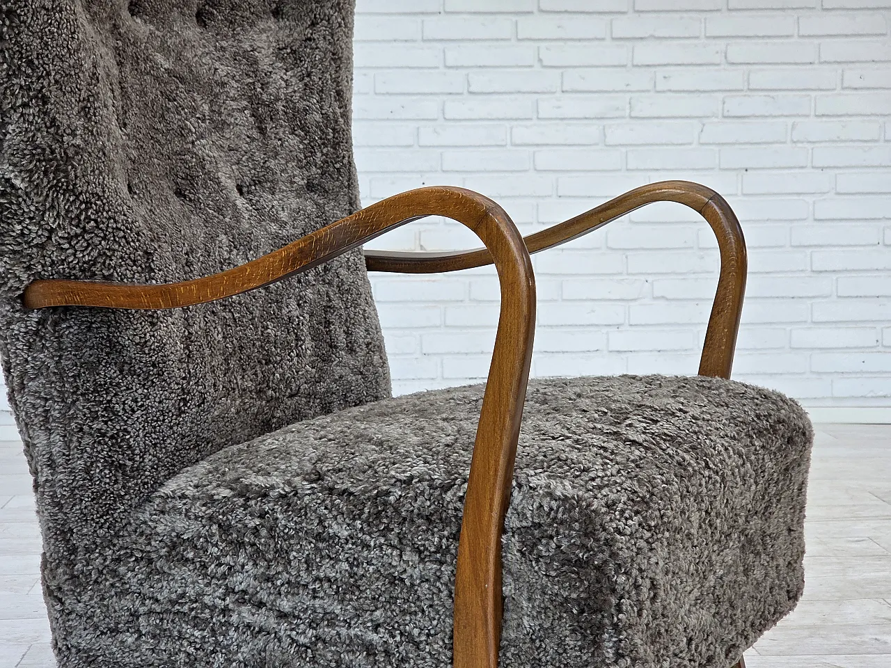 Reupholstered Danish armchair with stool sheepskin, 1960s 2