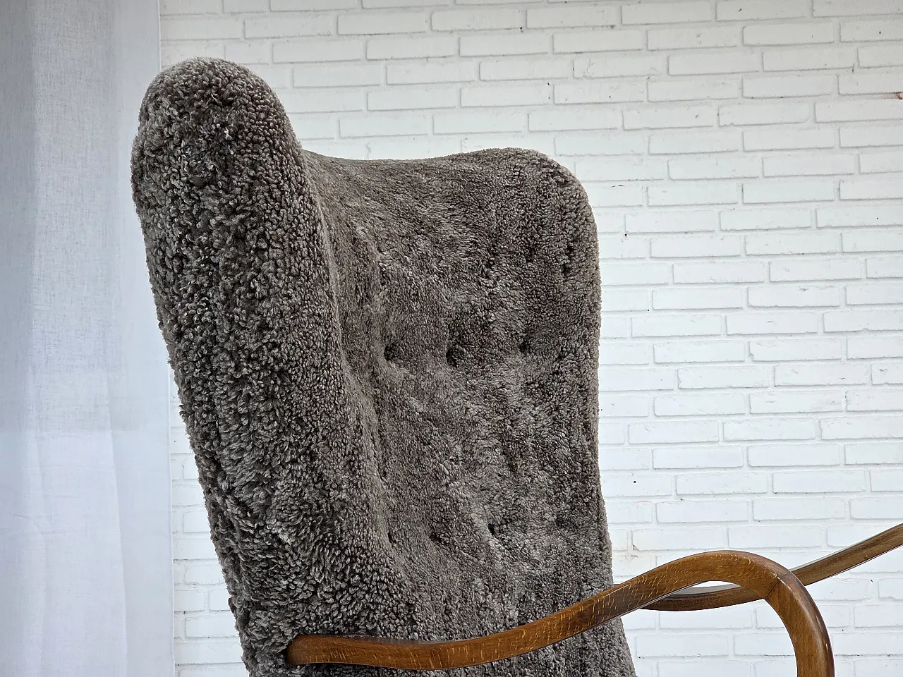 Reupholstered Danish armchair with stool sheepskin, 1960s 3