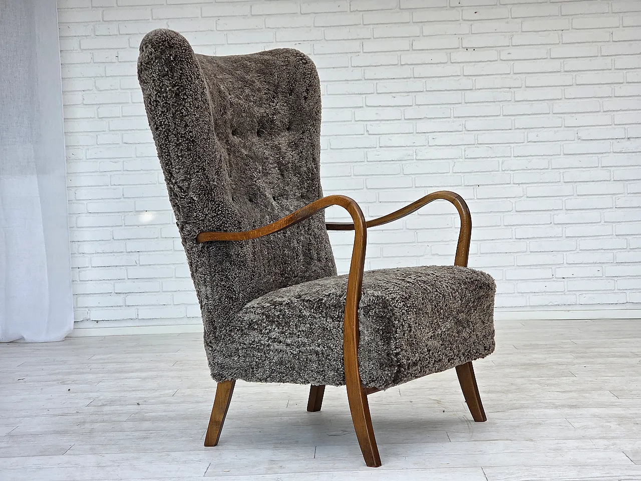 Reupholstered Danish armchair with stool sheepskin, 1960s 8