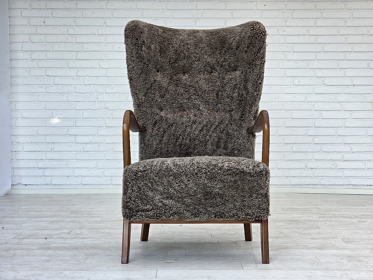 Reupholstered Danish armchair with stool sheepskin, 1960s 9