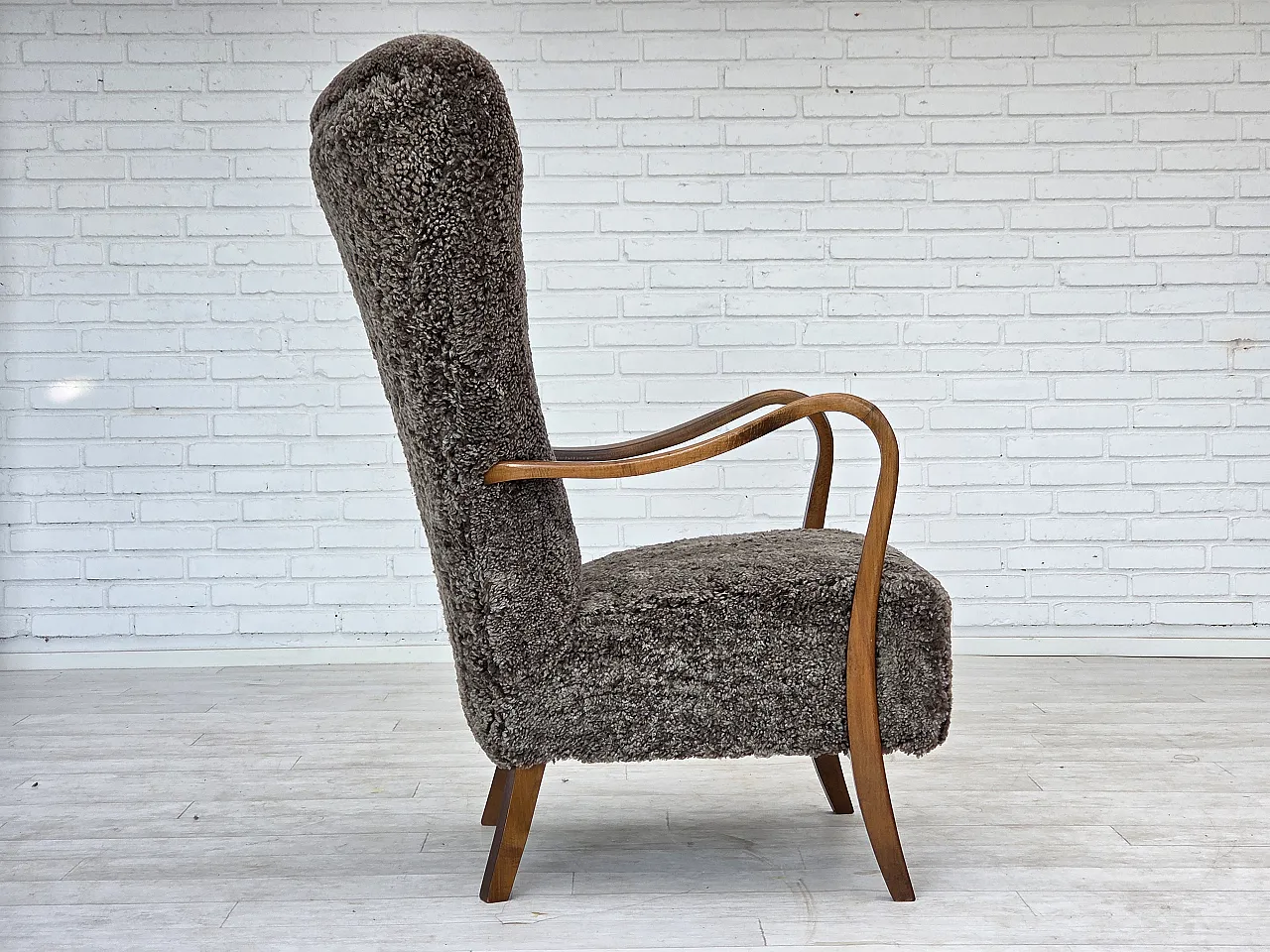 Reupholstered Danish armchair with stool sheepskin, 1960s 11