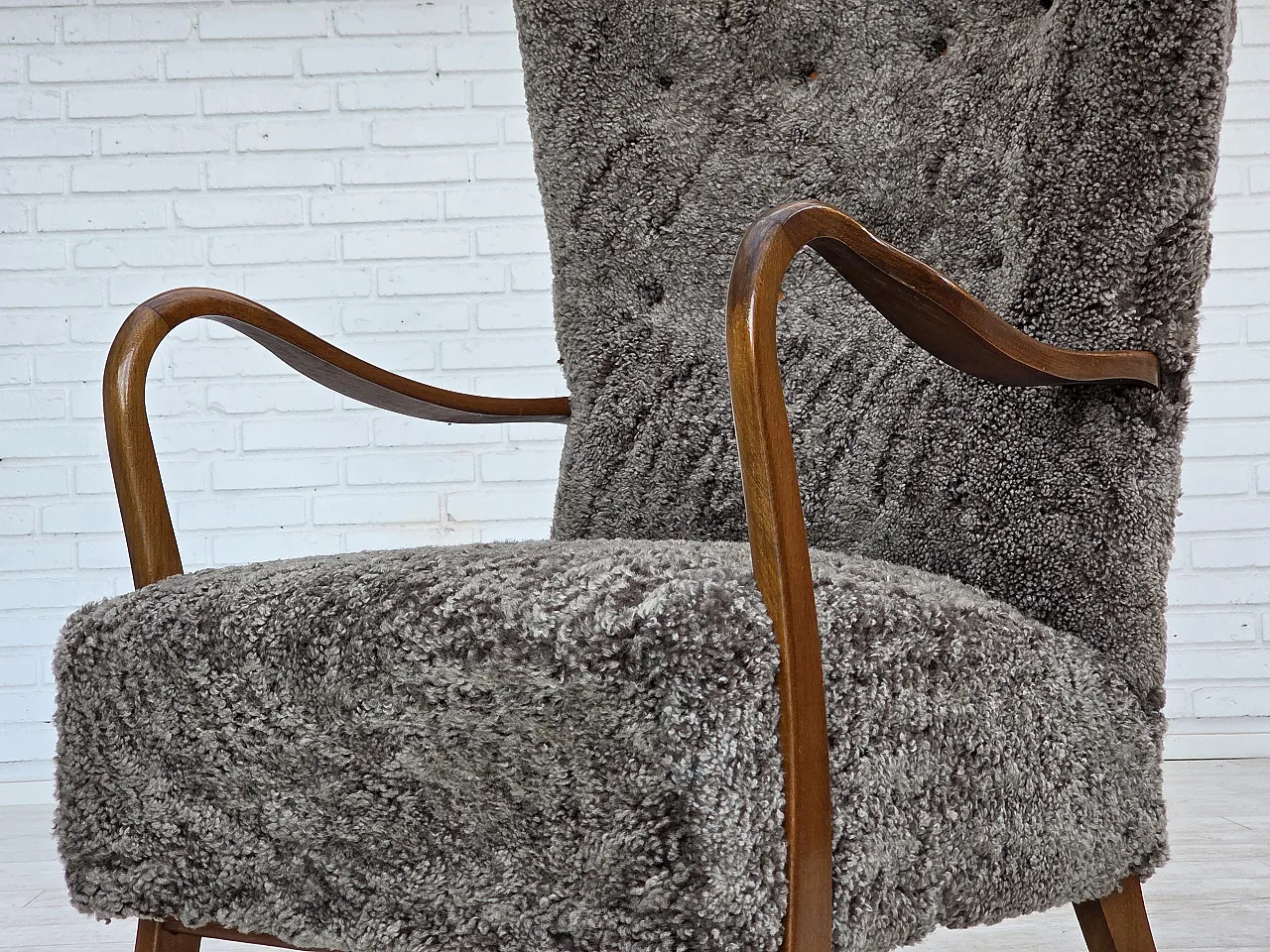 Reupholstered Danish armchair with stool sheepskin, 1960s 18