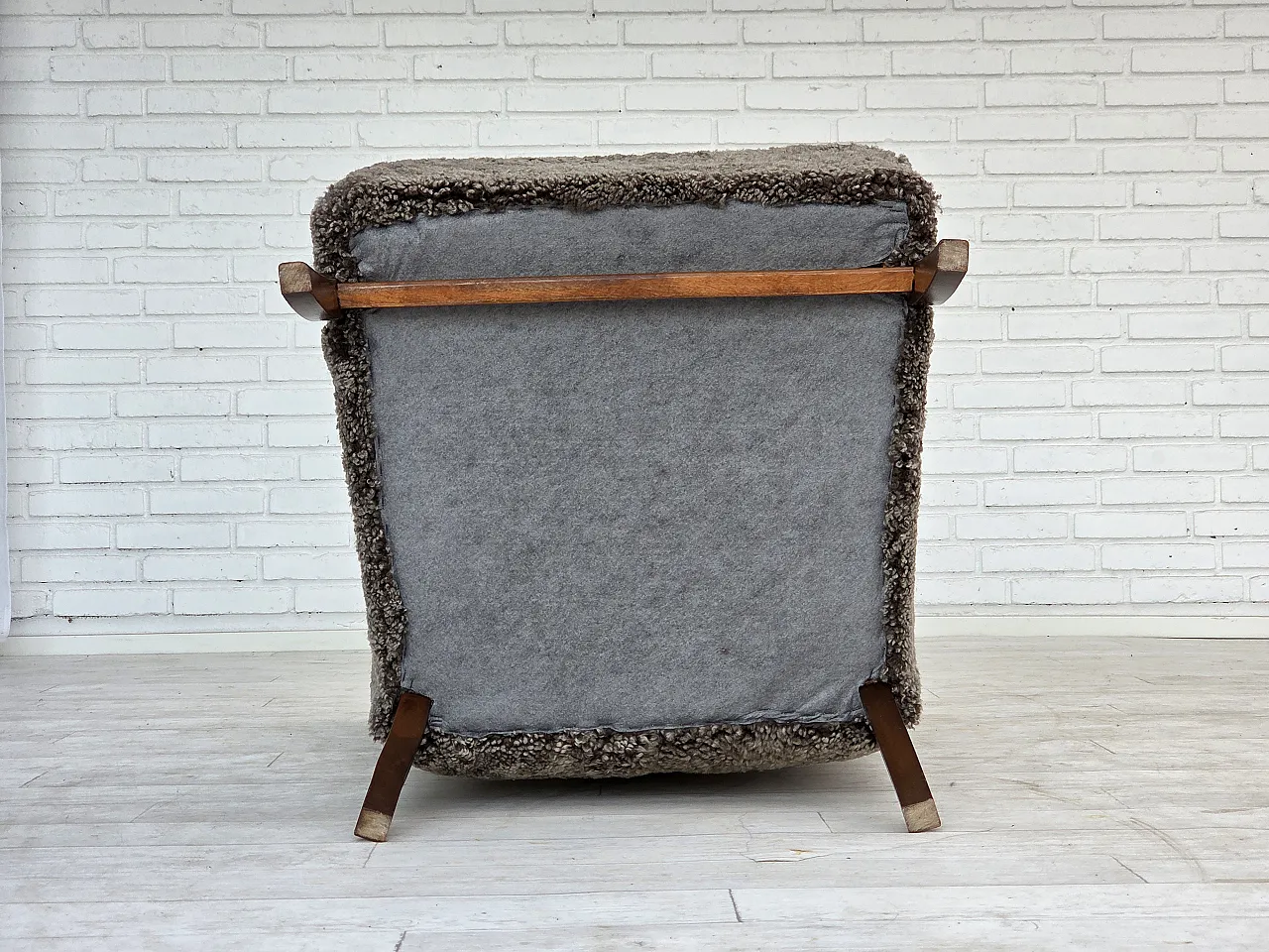 Reupholstered Danish armchair with stool sheepskin, 1960s 19