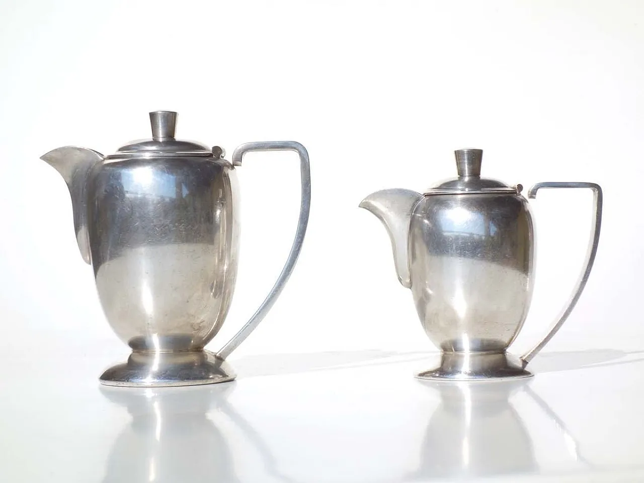 Pair of silver Alpacca Hotel teapots, 1920s 1